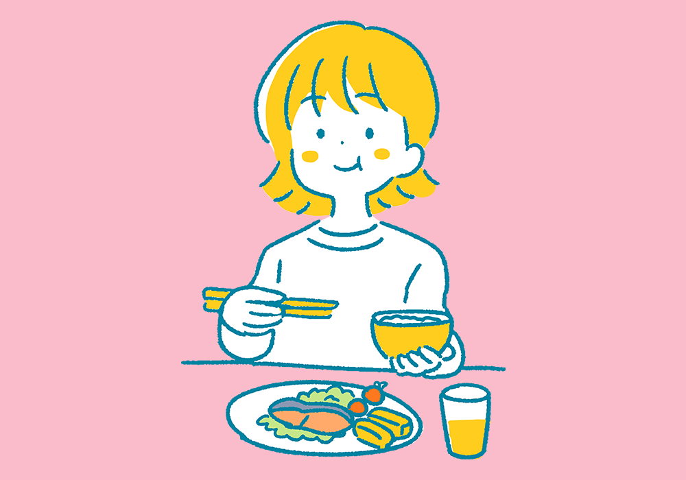 食事をする女性